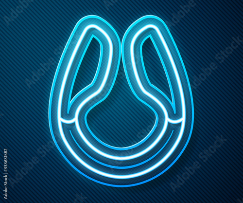 Glowing neon line Dildo vibrator for sex games icon isolated on blue background. Sex toy for adult. Vaginal exercise machines for intimate. Vector Illustration