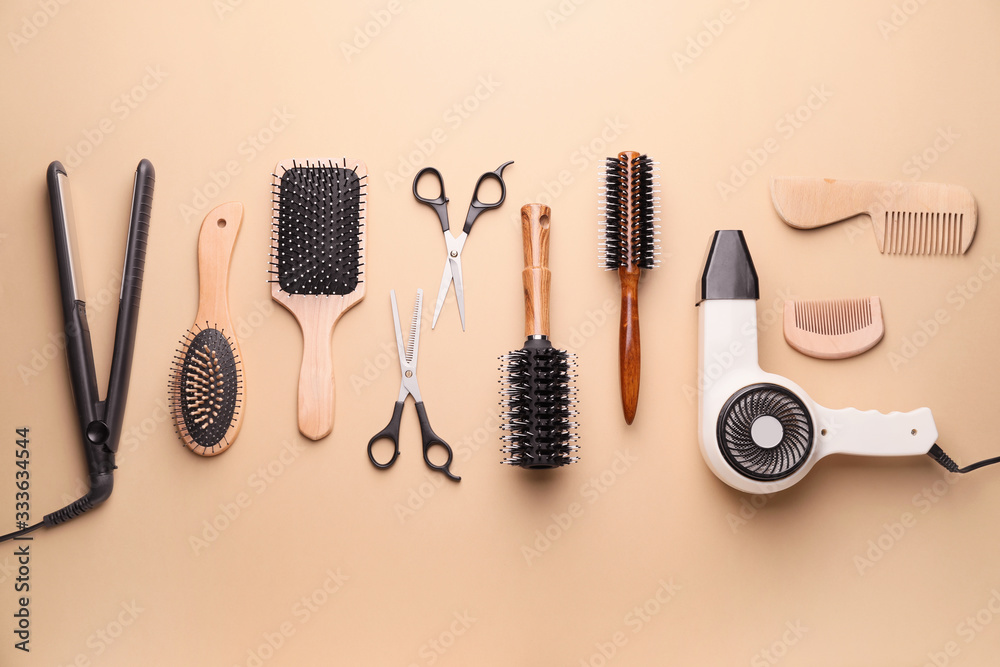 Set of hairdresser's accessories on color background - obrazy, fototapety, plakaty 