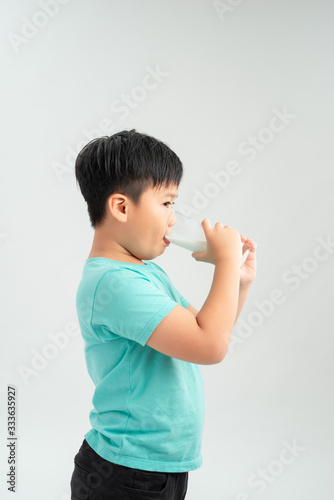 A drinking milk boy on the white background.