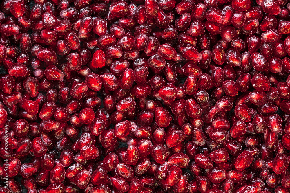 A lot of peeled pomegranate's seed A lot of peeled pomegranate's seed