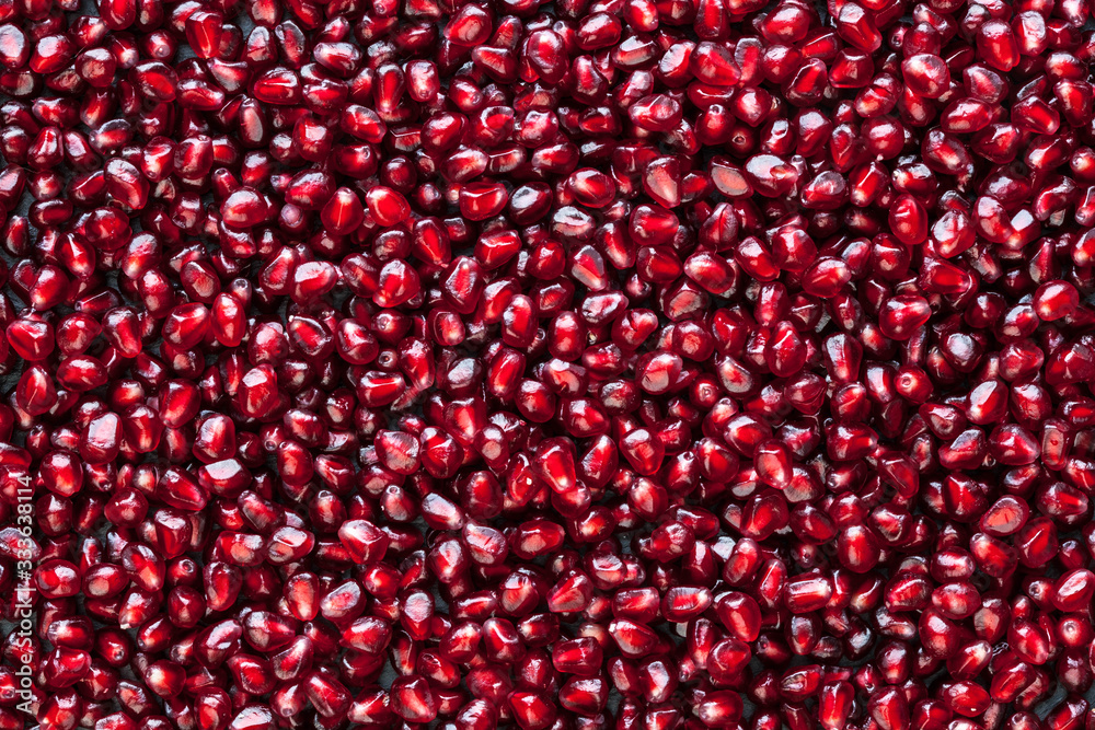 A lot of peeled pomegranate's seed A lot of peeled pomegranate's seed