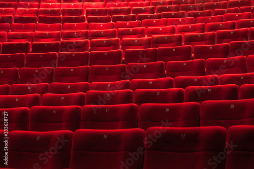 Cinema auditorium with one reserved seat