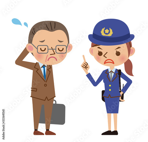 サラリーマンを注意する女性警察官