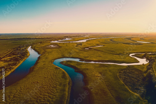 Aerial panorama of the rivers of the Astrakhan region in the spring. Akhtuba river. photo