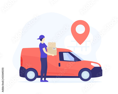 delivery boy holding boxes near mini van
