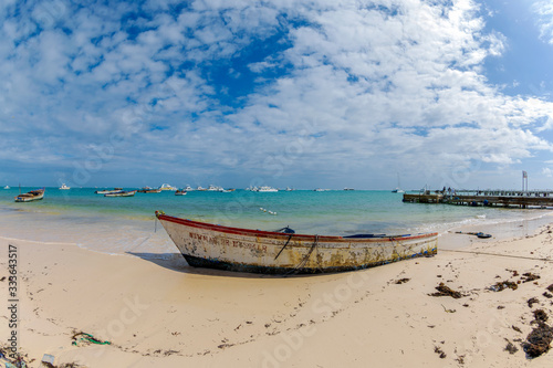 Beautiful old boat and sand beach in Punta Cana, Dominican Republic