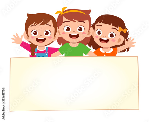 happy cute little kid girls with blank banner
