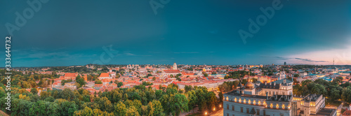 Vilnius, Lithuania, Eastern Europe. Historic Center Cityscape In Blue Hour After Sunset. Travel Panorama Of Old Town In Night Illuminations. UNESCO. Palace Of Grand Dukes Of Lithuania.