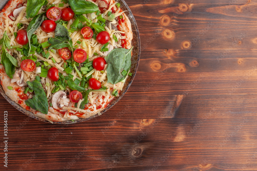 Homemade pizza before baking Homemade pizza before baking