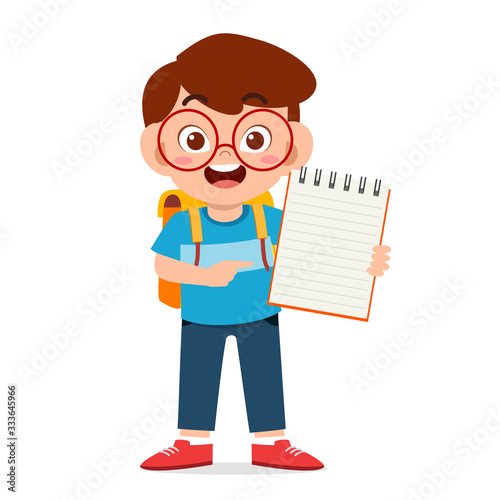happy cute little kid boy hold notebook and pencil