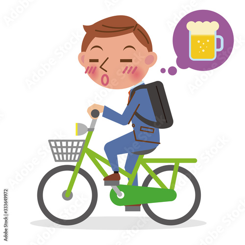 自転車を飲酒運転するビジネスマン