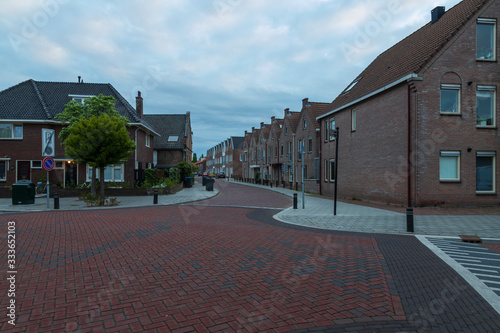 Water canal in Meppel, Holland at sunrise. The background is the sky with clouds. photo