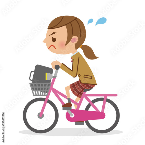 必死に自転車をこぐ女子生徒