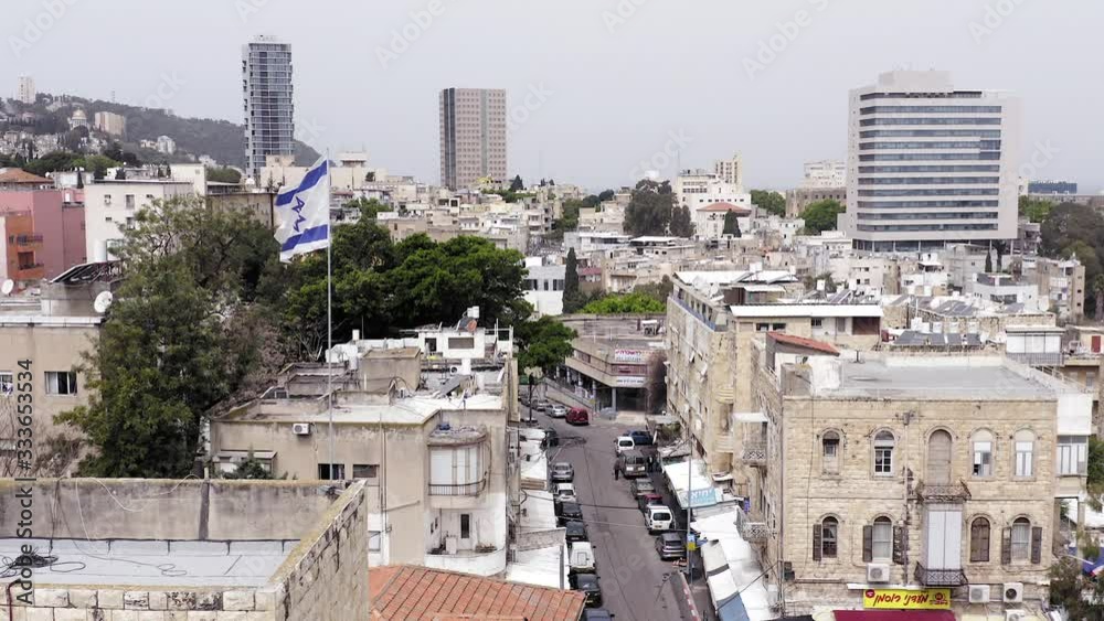 Corona Virus days, Empty street and closed shops at of Haifa Talpiot food market, due to Government lockdown guidelines, Aerial view. Corona Virus days, Empty street and closed shops at of Haifa Talpiot food market, due to Government lockdown guidelines, Aerial view.
