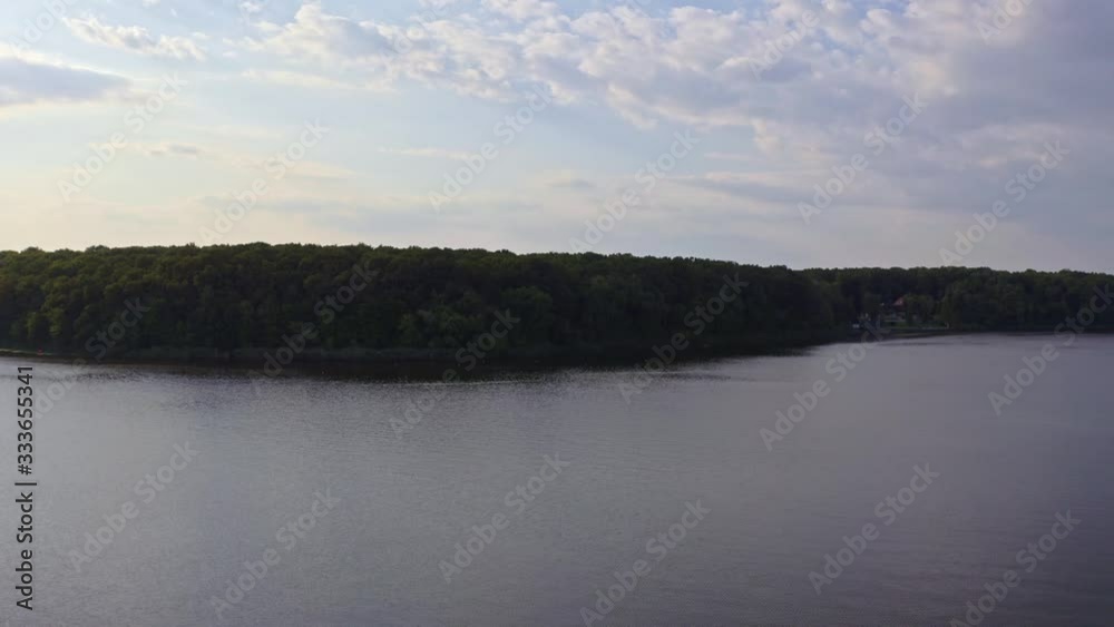 Sunset over a lake and woods, drone shot, 4k Sunset over a lake and woods, drone shot, 4k