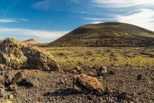 Volcano Black Mountain, on Montana Negra, in Tinajo, Lanzarote, Canary islands photo