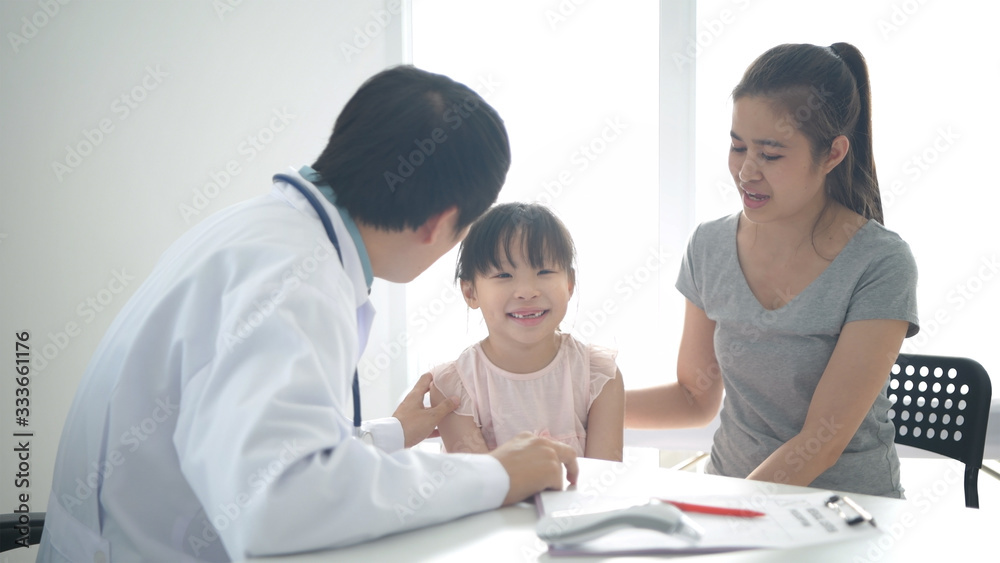 Medical concepts. The doctor is examining the thyroid of the patient within the clinic. 4k Resolution. Medical concepts. The doctor is examining the thyroid of the patient within the clinic. 4k Resolution.