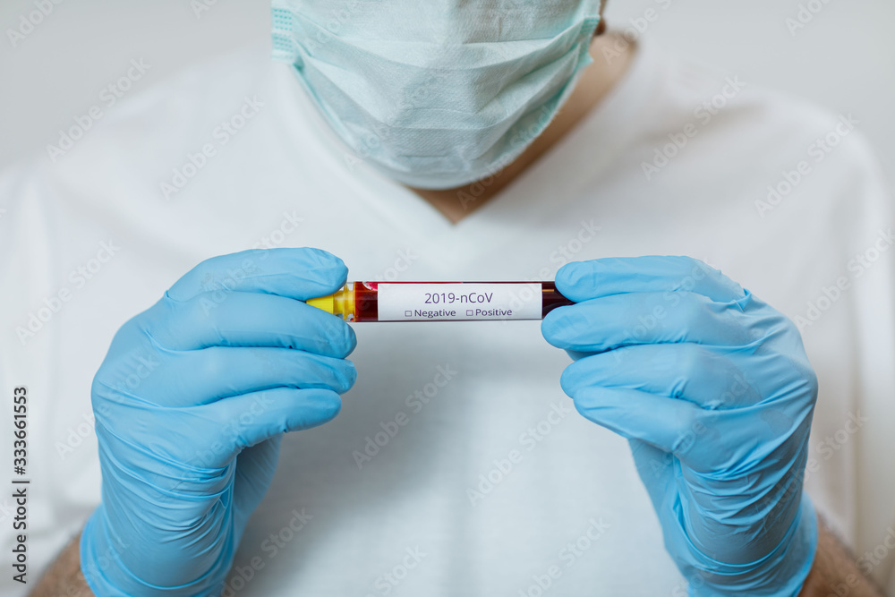 2019-nCoV Coronavirus. Blood Sample in Doctors Hand. Respiratory Syndrome. Coronavirus outbreaking 2019-nCoV Coronavirus. Blood Sample in Doctors Hand. Respiratory Syndrome. Coronavirus outbreaking