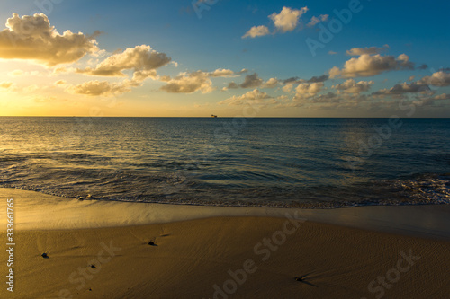 Sunset on a deserted beach in Antigua, Caribbeans