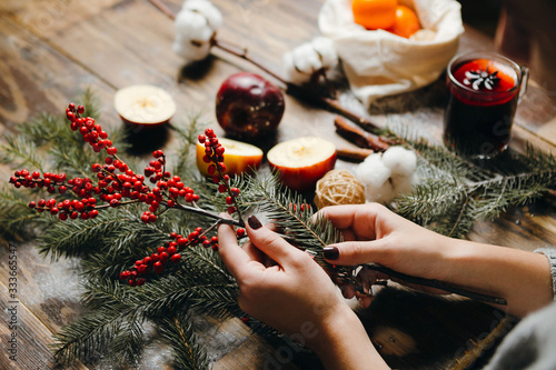 Making Christmas wreath, decorating the house for Christmas.