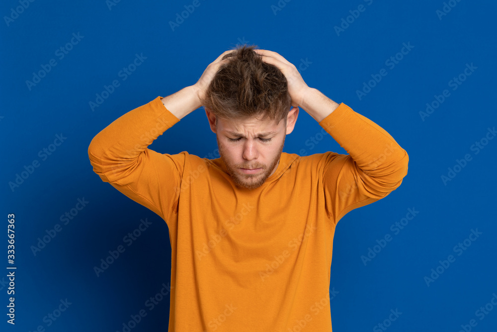 Attractive young guy with a yellow T-shirt Attractive young guy with a yellow T-shirt