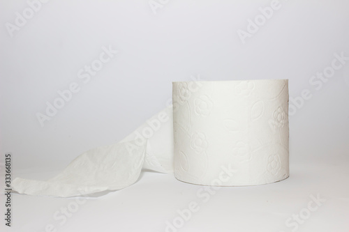 Toilet paper roll close up on white background