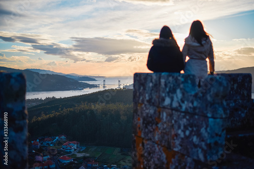 Two women contemplating Vigo from the Peneda mountain photo