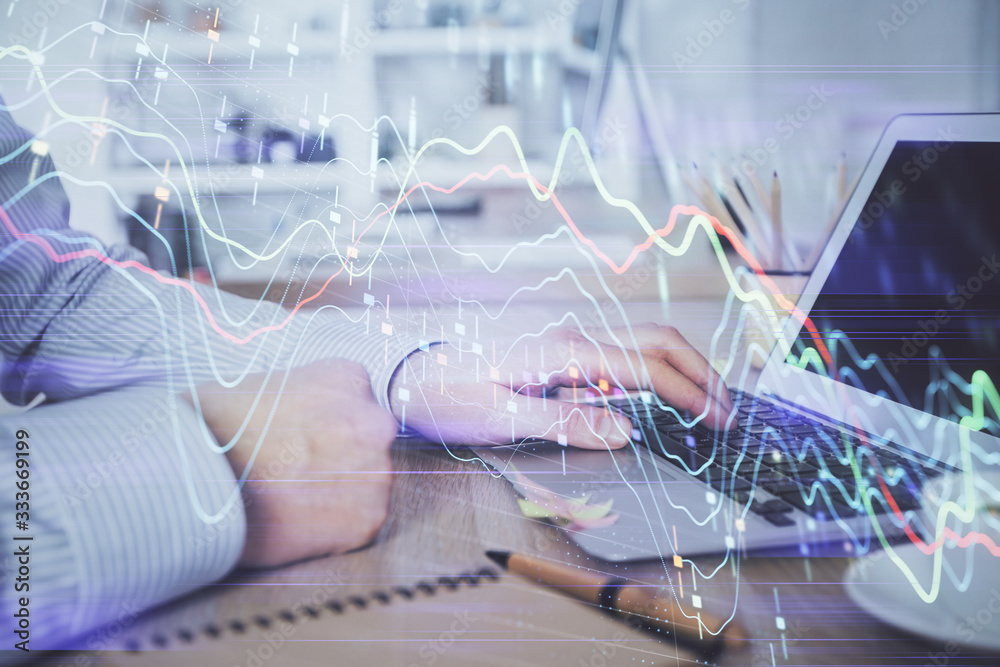 Multi exposure of stock market chart with man working on computer on background. Concept of financial analysis.