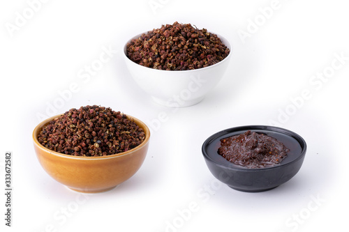 Chines Chili called Mala in bowl with Mala seed on side  Very hot and spicy . isolated on white background.