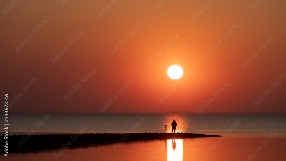 Sunset with man shadow Sunset with man shadow