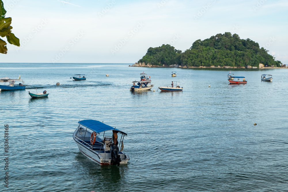 group of speed boat for island hoping activities moored on the Nipah Bay pangkor Island, Malaysia group of speed boat for island hoping activities moored on the Nipah Bay pangkor Island, Malaysia