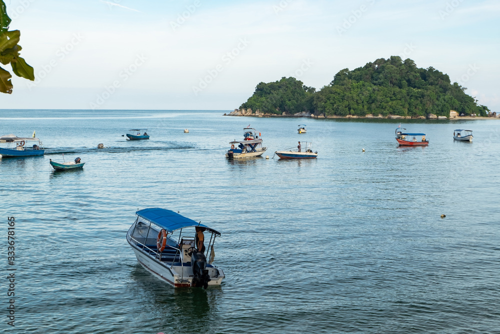 group of speed boat for island hoping activities moored on the Nipah Bay pangkor Island, Malaysia