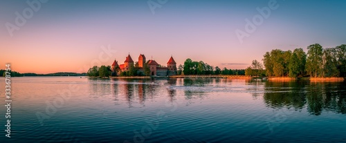 Beautiful spring sunset over the lake and Trakai Castle, Lithuania © MKozloff