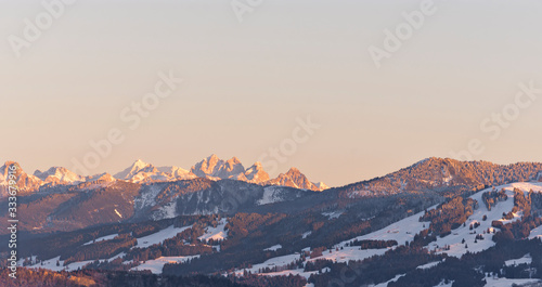 Sunset in the mountains in winter. Allgau Alps, Bavaria, Germany