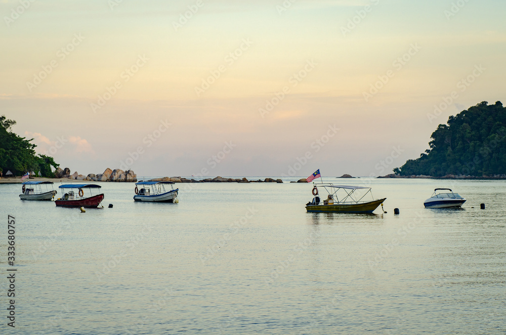 Naklejka premium group of speed boat for island hoping activities moored on the Nipah Bay pangkor Island, Malaysia