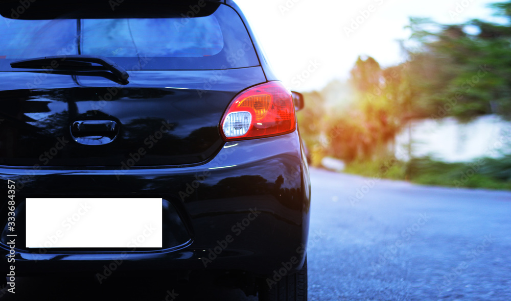 Black car on parking, Close Up Side of Blackcar on the Road Black car on parking, Close Up Side of Blackcar on the Road