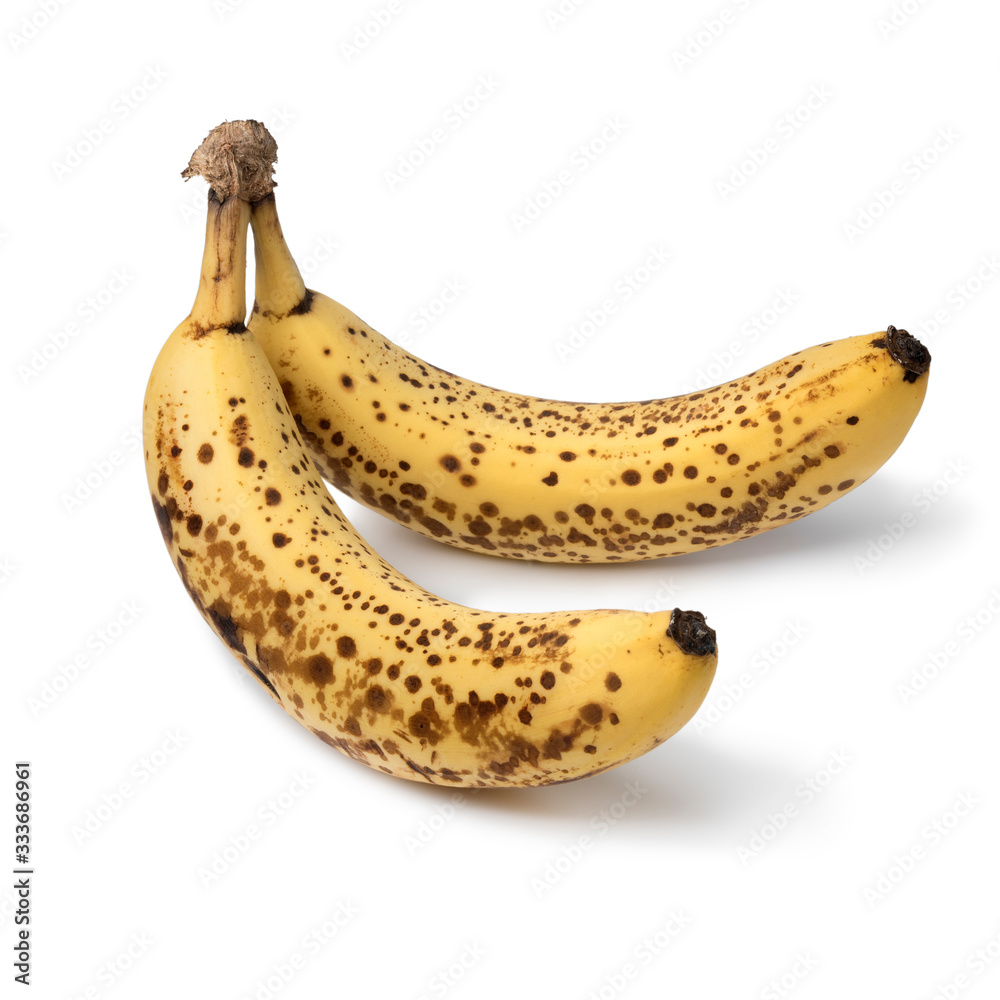 Pair of ripe bananas with brown spots