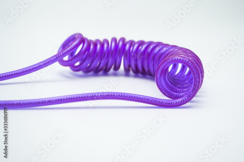 Violet flexible wire with white background