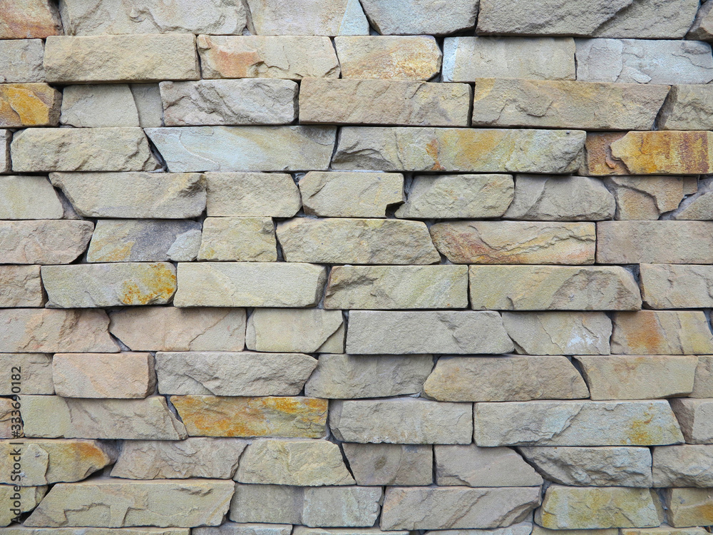 Fototapeta premium texture of stone on wall of different rocks 