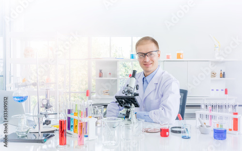 Scientist working or research for some confidential in chemical laboratory