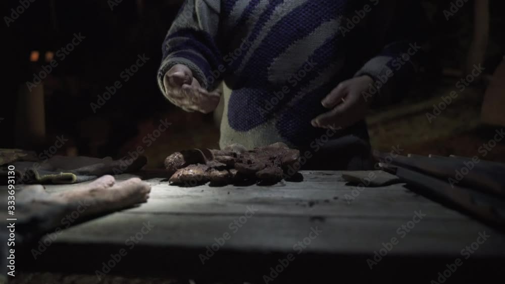 Craftsman taking of his gloves Craftsman taking of his gloves