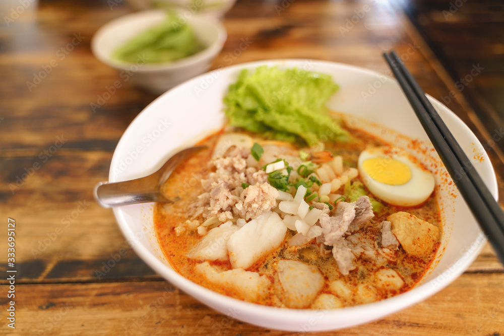 Thai traditional spicy seafood noodles or Tom Yum Thai traditional spicy seafood noodles or Tom Yum
