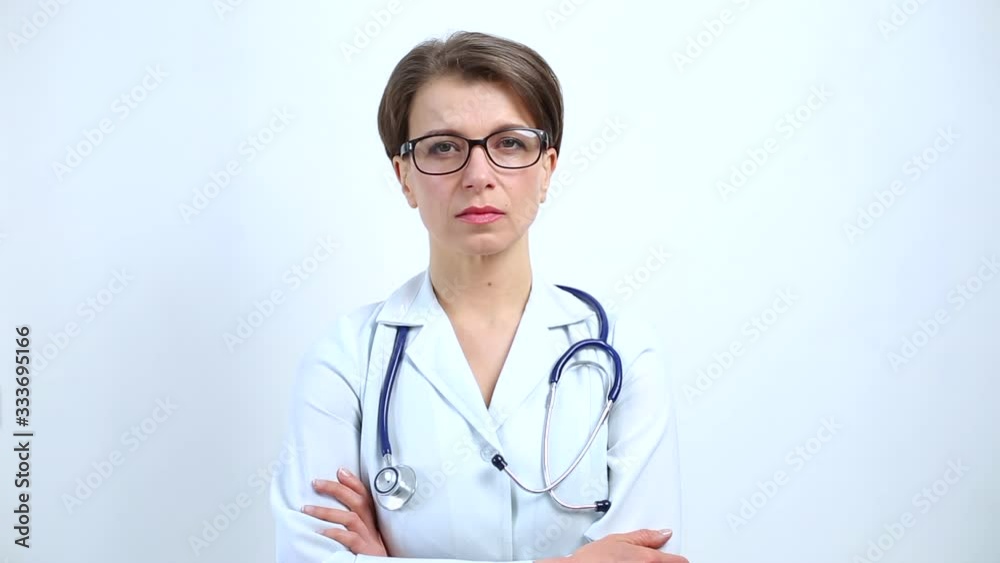 Portrait of a female doctor with a stethoscope on a white background. Portrait of a female doctor with a stethoscope on a white background.