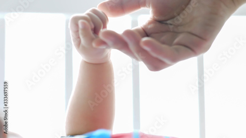 Hand contact new Born