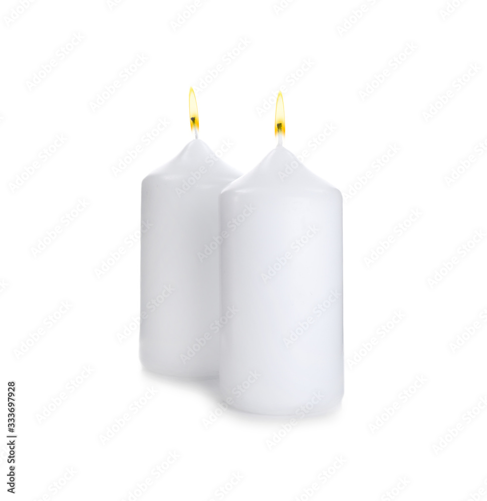 Wax candles with wicks isolated on white Wax candles with wicks isolated on white