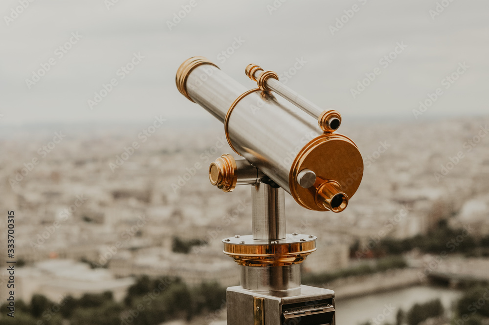 Eiffel Tower telescope overlooking for Paris