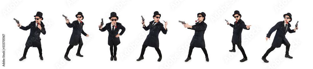 Young detective in black coat holding handgun isolated on white Young detective in black coat holding handgun isolated on white