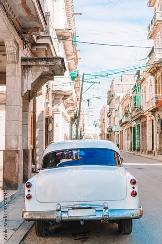 View of yellow classic vintage car in Old Havana  Cuba