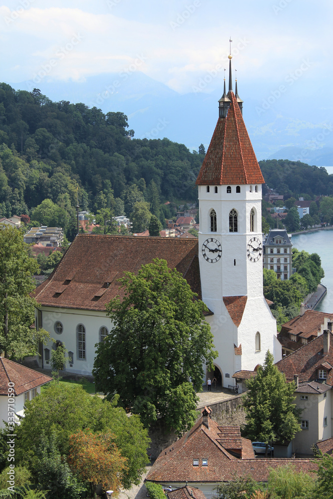View of the picturesque Stadt Kirshce (Church) in Thun, a town in the Canton of Bern in Switzerland.