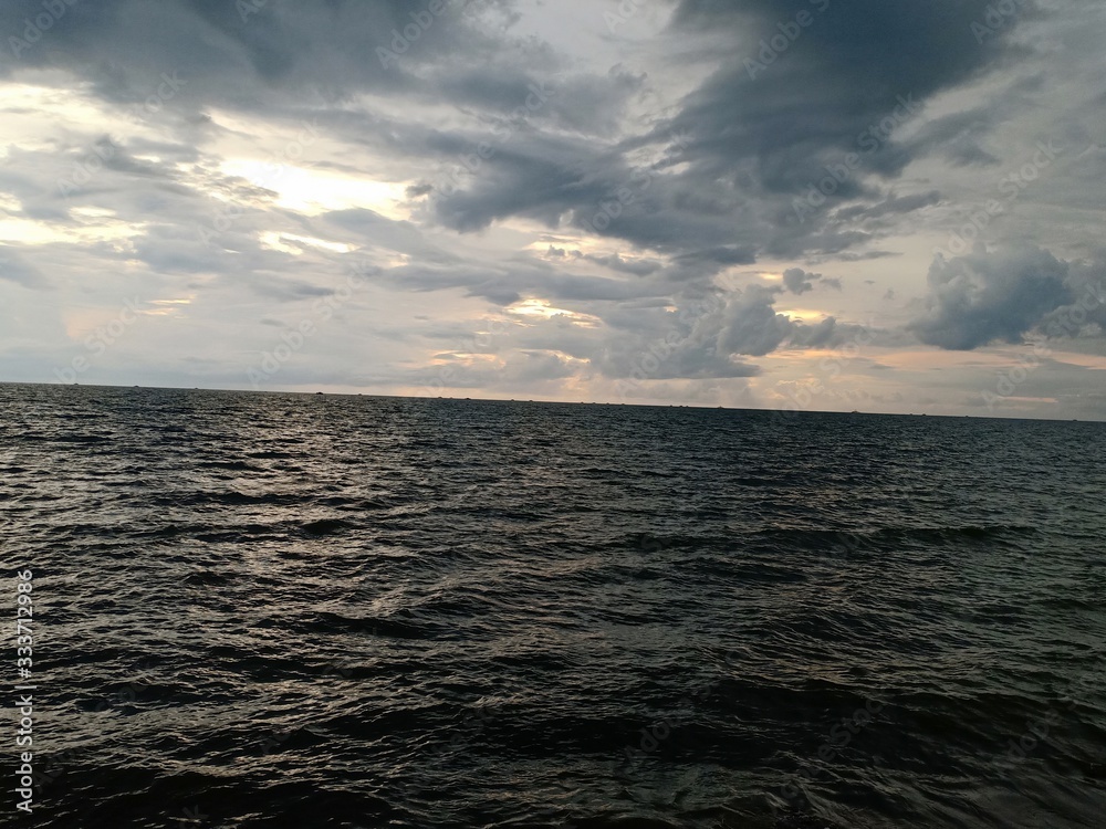 Obraz premium beach with a sunset background